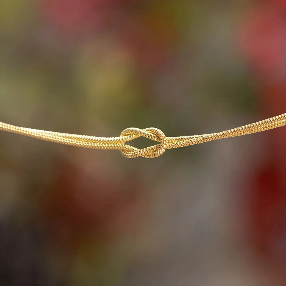 eManco Fashion High Quality Stainless Steel Gold Plated Couple Bracelets Classic Round Snake Chain Knotted Simple Accessories